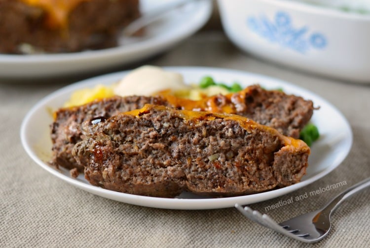 instant pot meatloaf with cheddar cheese and bbq sauce on plate