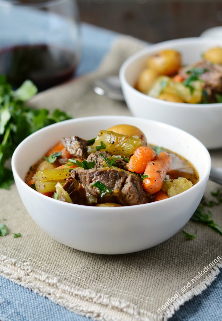 vegetable beef stew in white bowls