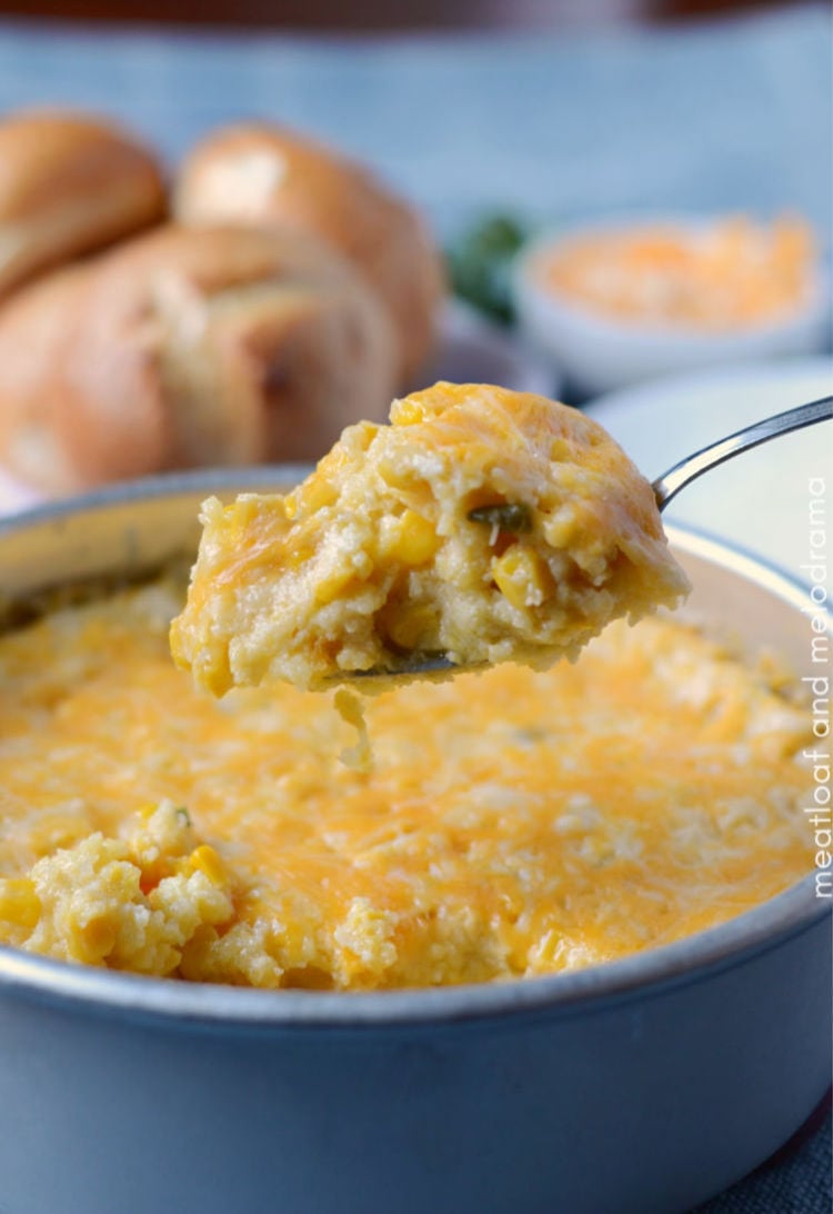 instant pot corn casserole with cheese and jalapeno peppers on serving spoon