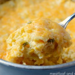 instant pot corn casserole with cheese on a spoon