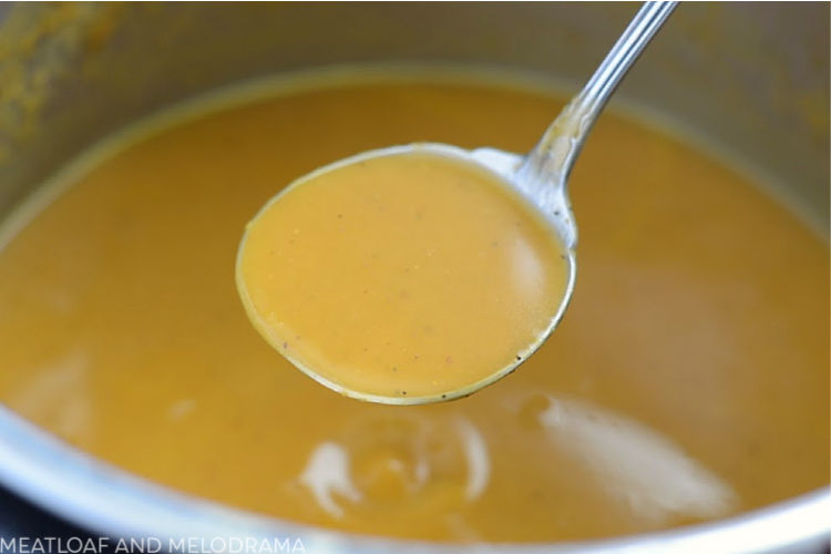 instant pot easy pumpkin soup in ladle