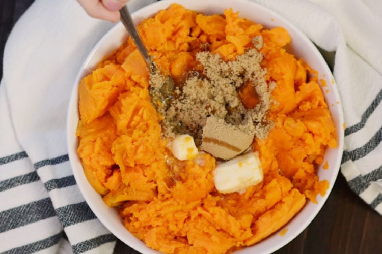 stir maple syrup and brown sugar and butter into instant pot mashed sweet potatoes