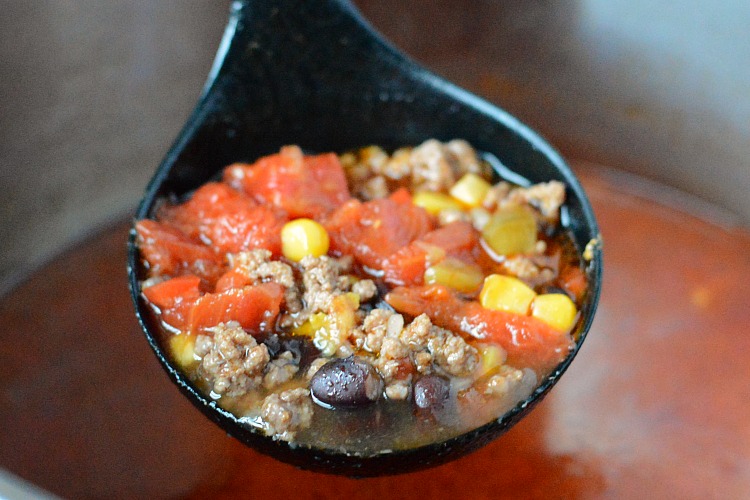 instant pot taco soup in ladle