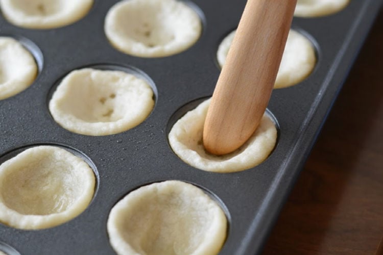 sugar cookie dough cups in muffin tin