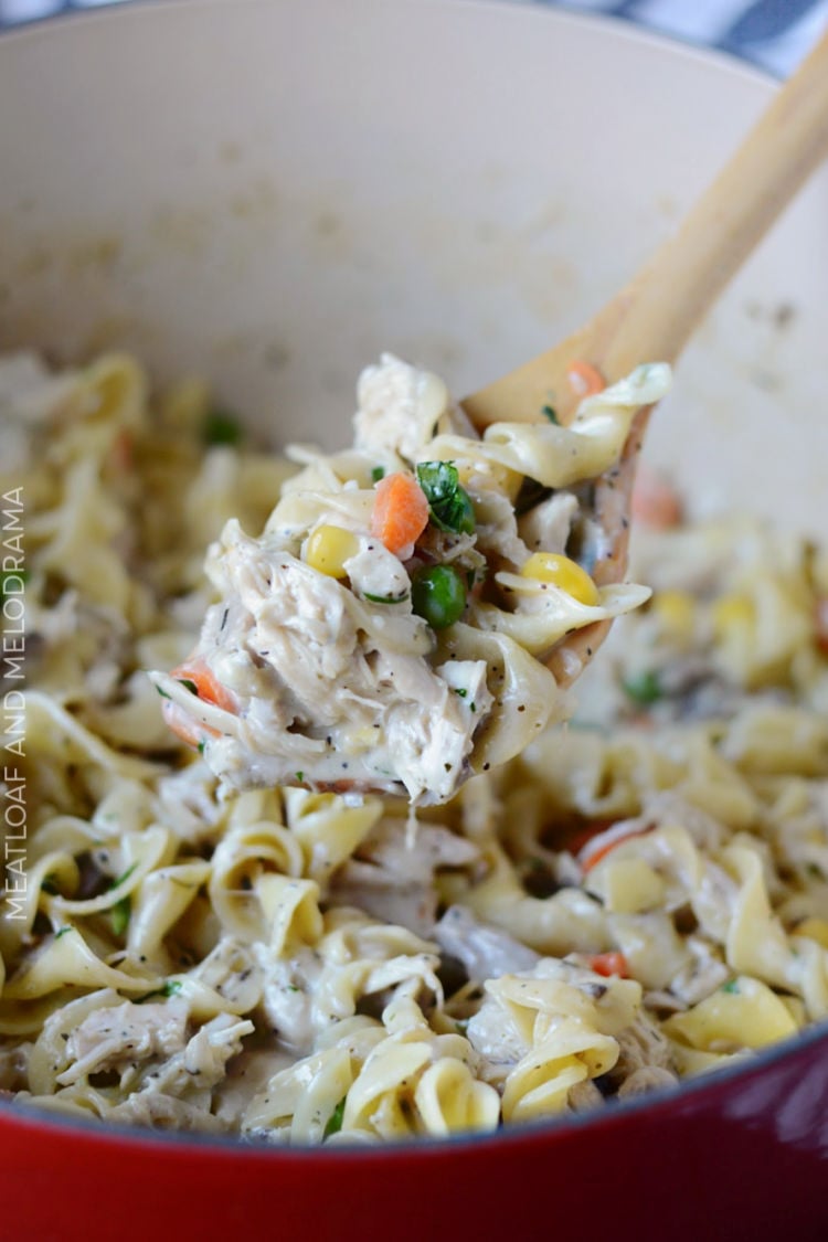 one pot turkey noodle casserole on wooden spoon