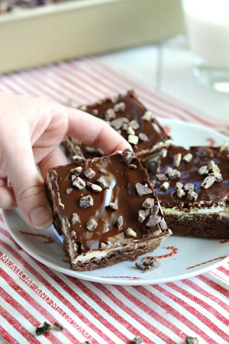 mint chocolate chip brownies with andes mints in hand