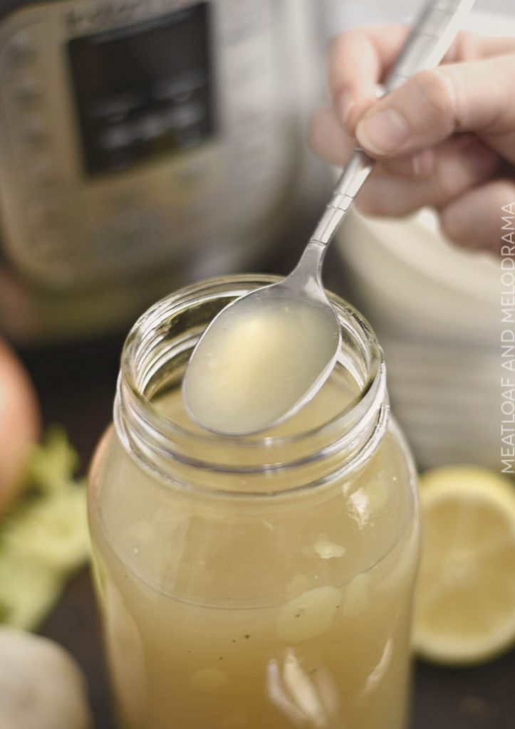 jellied chicken bone broth made in instant pot pressure cooker on spoon