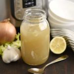 homemade instant pot chicken stock bone broth in mason jar