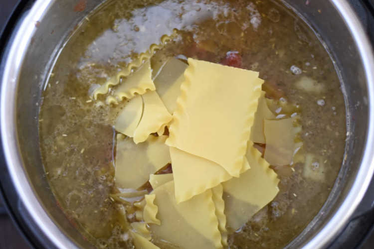 lasagna soup ingredients with pasta in pressure cooker