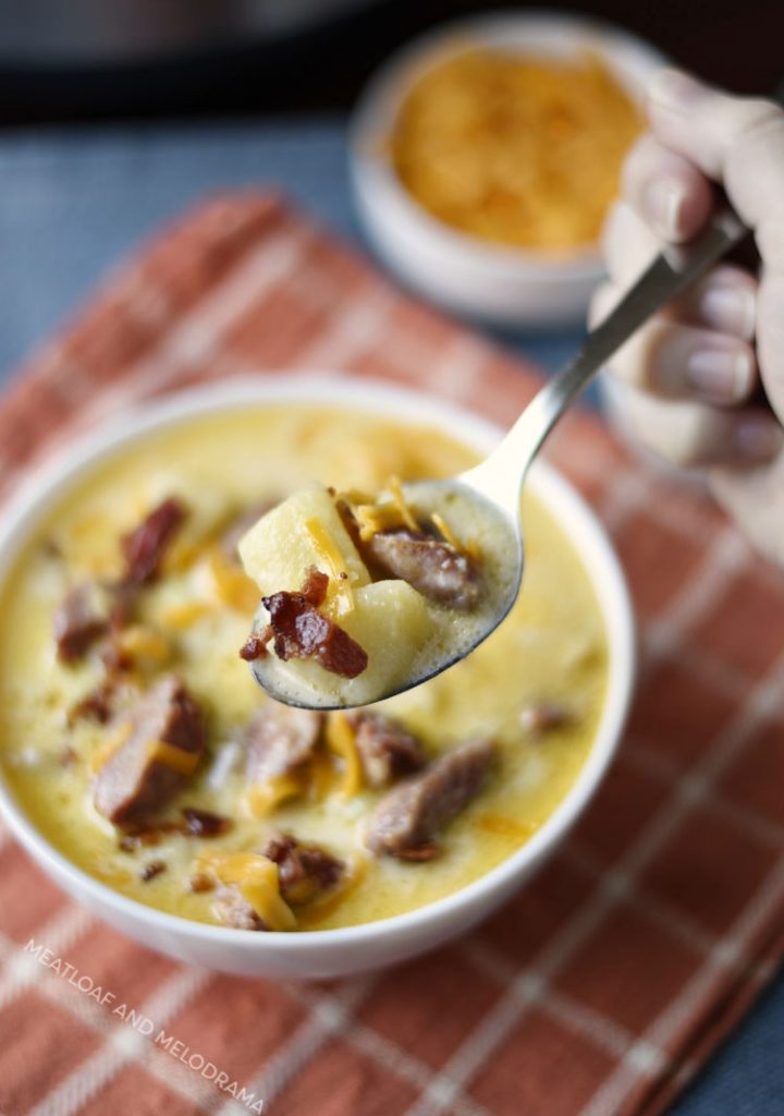 instant-pot-potato-soup with kielbasa and bacon on spoon