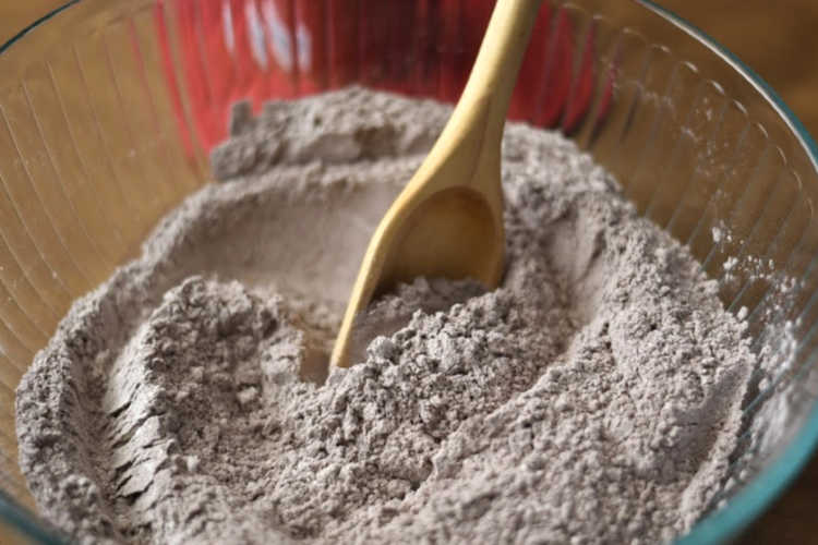 mix flour with cocoa powder in bowl for double chocolate chip cookies