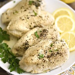 cooked instant pot chicken breasts on serving platter
