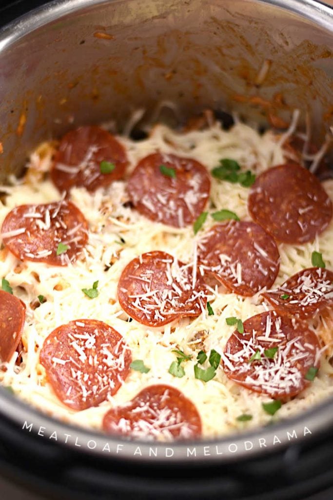 instant pot pizza pasta with mozzarella cheese and pepperoni in pot