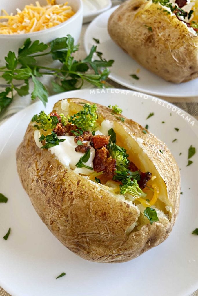 loaded baked potato on plate