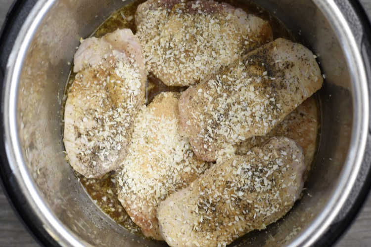 boneless pork chops seasoned with broth in instant pot