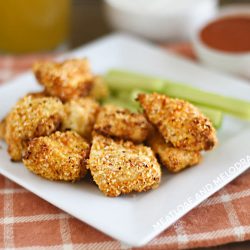 air fryer buffalo chicken nuggets on plate with celery