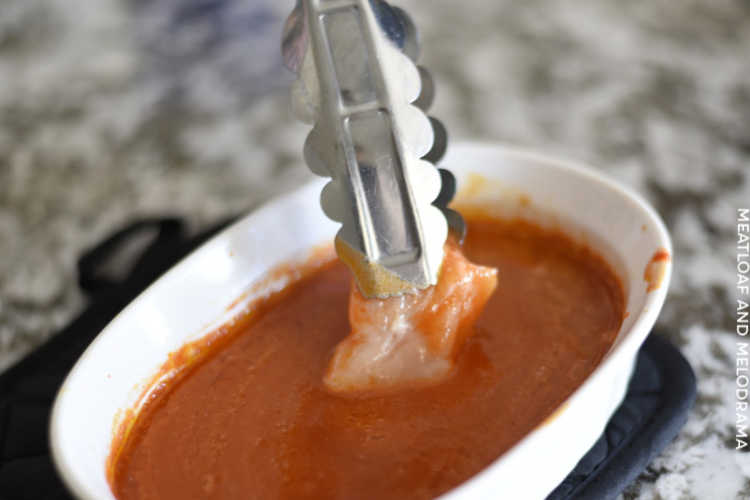 dip cut chicken breasts in hot buffalo sauce