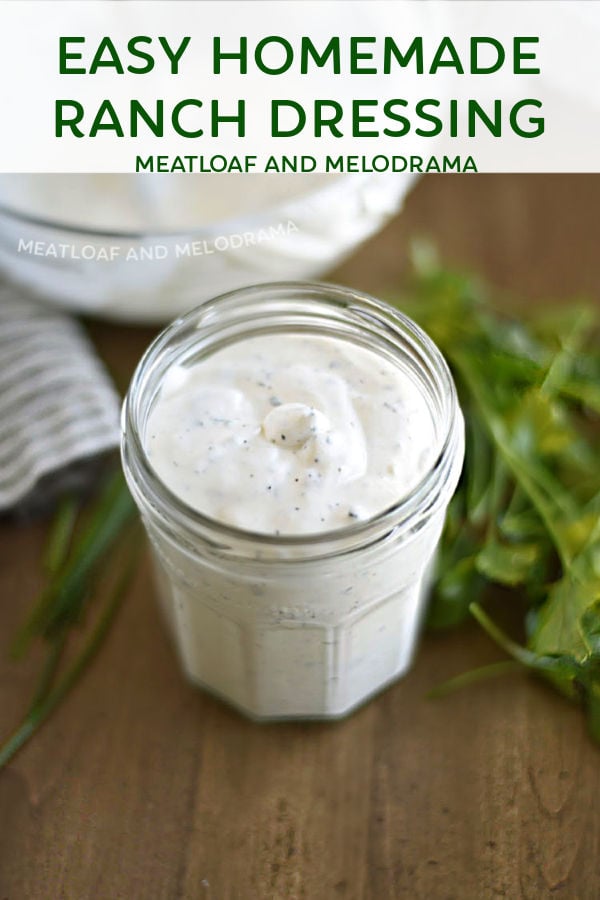 homemade ranch dressing in glass jar with parsley and chives