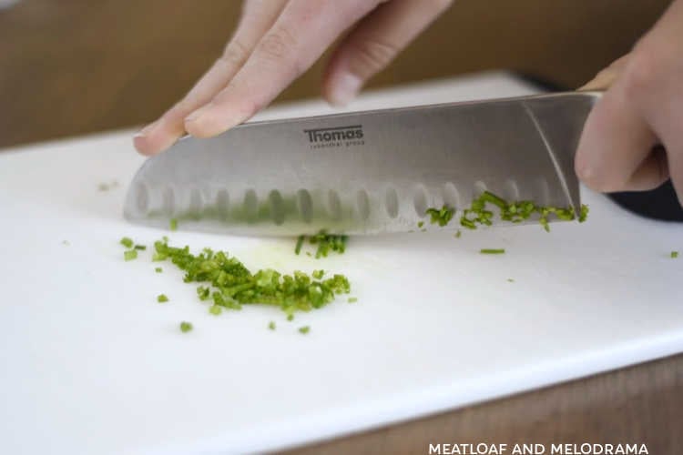 knife chopping chives for ranch dressing