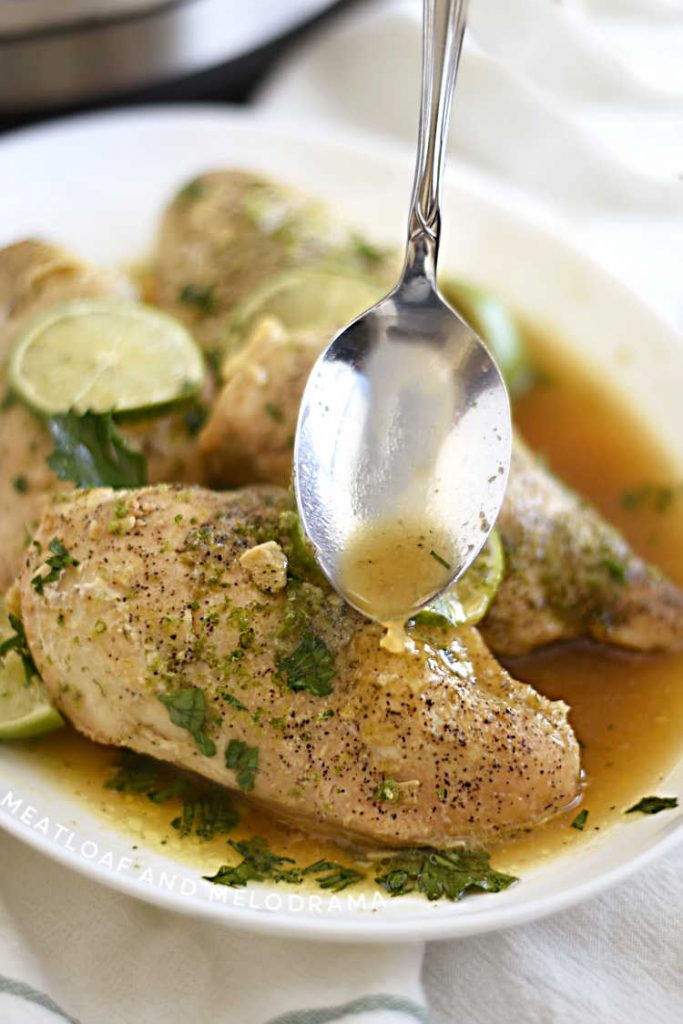 spoon sauce over honey lime chicken breasts