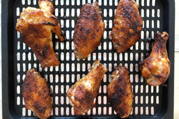 dry rubbed air fried crispy chicken wings on cooking rackay