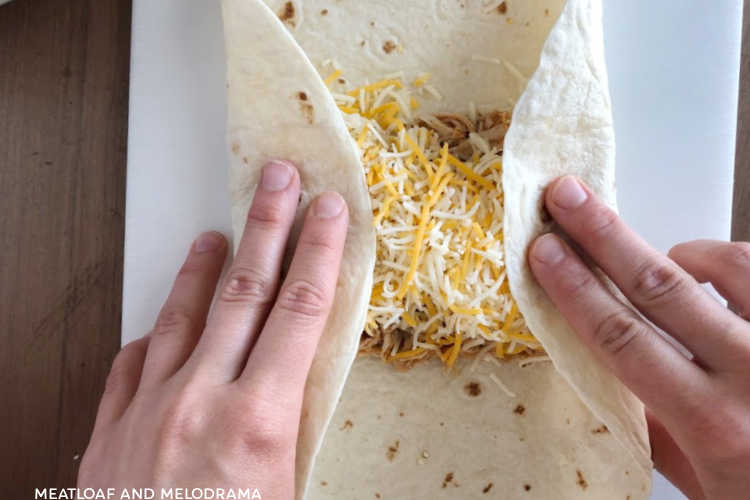 fold tortilla ends over chicken and cheese
