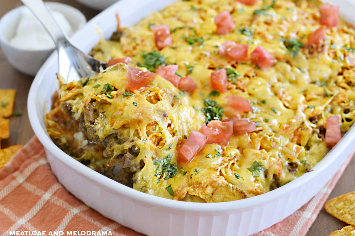 easy doritos casserole with ground beef and cheese on a spoon