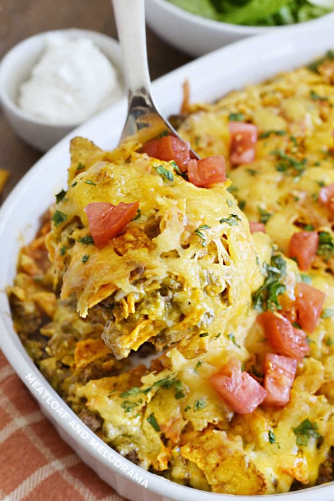 doritos ground beef and cheese casserole on a serving spoon