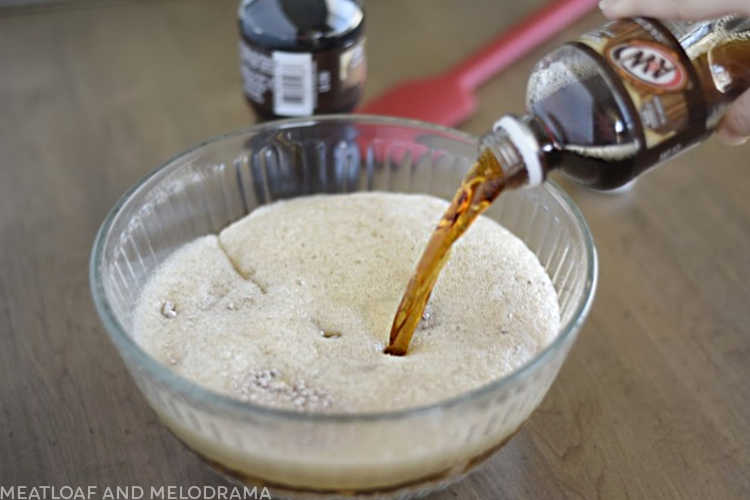 pour root beer into cake mix