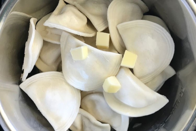 frozen pierogi with butter in the Instant Pot