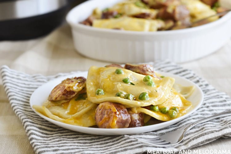 creamy instant pot pierogi casserole with kielbasa and peas on a plate