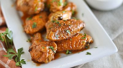 air fryer buffalo chicken wings on a white platter