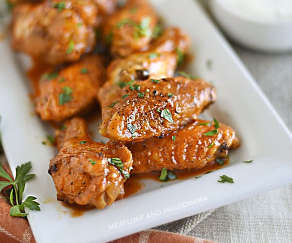 air fryer buffalo chicken wings on a white platter