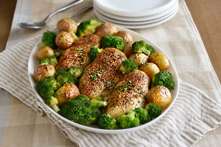 air fried chicken breasts and potatoes with broccoli on platter