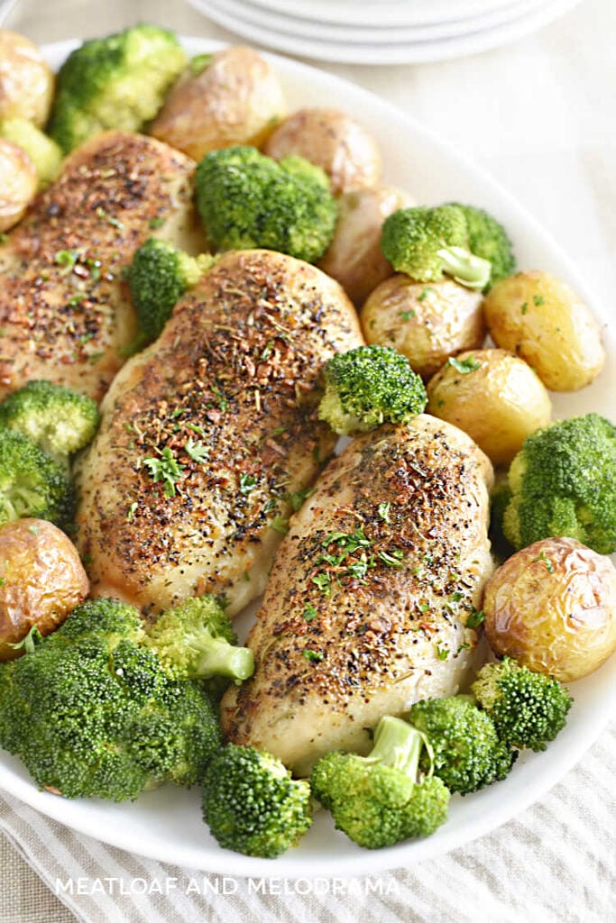 chicken dinner with air fried chicken breasts, potatoes and broccoli on serving platter