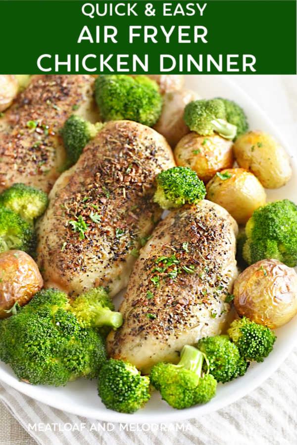 air fryer chicken and potatoes with broccoli on a white serving platter [