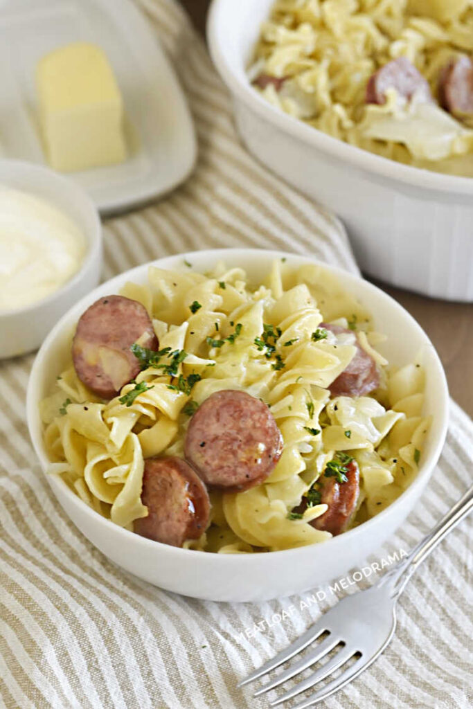 bowl of halusky egg noodles, cabbage and smoked sausage