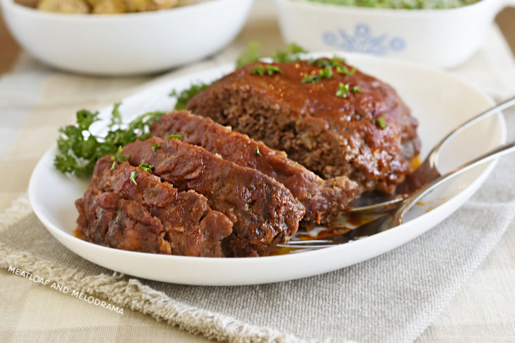 favorite meatloaf topped with savory tomato sauce glaze on a white platter
