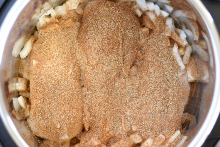 seasoned chicken breasts and onions in the instant pot pressure cooker