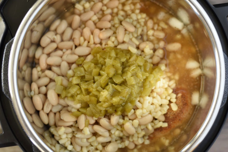 white beans, corn and green chile peppers oven chicken in the instant pot pressure cooker