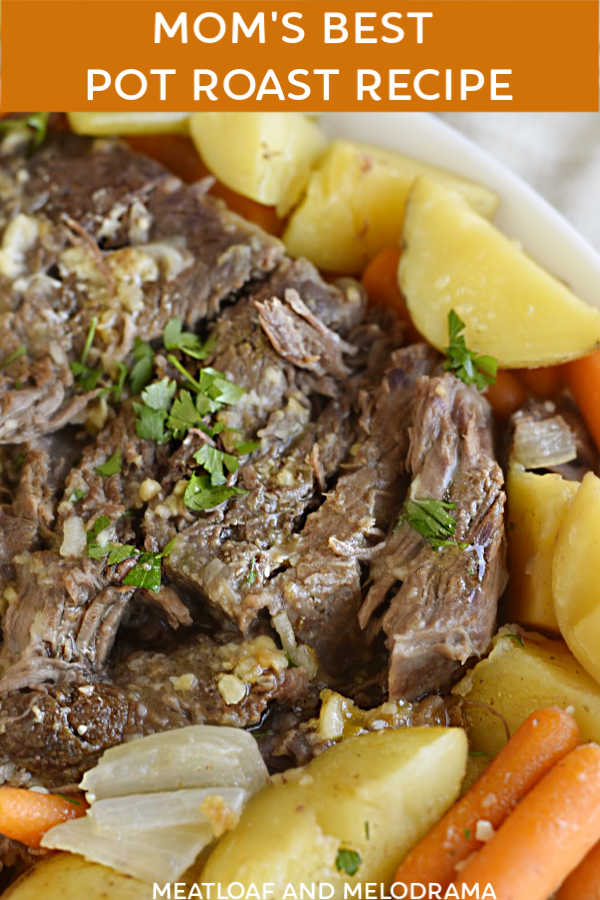 closeup of beef chuck pot roast with potatoes and carrots