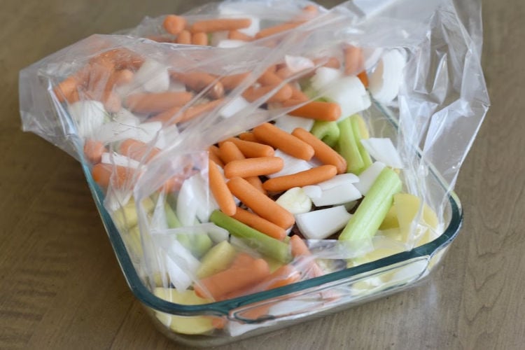 chuck roast in an oven bag with baby carrots, celery, potatoes and onions