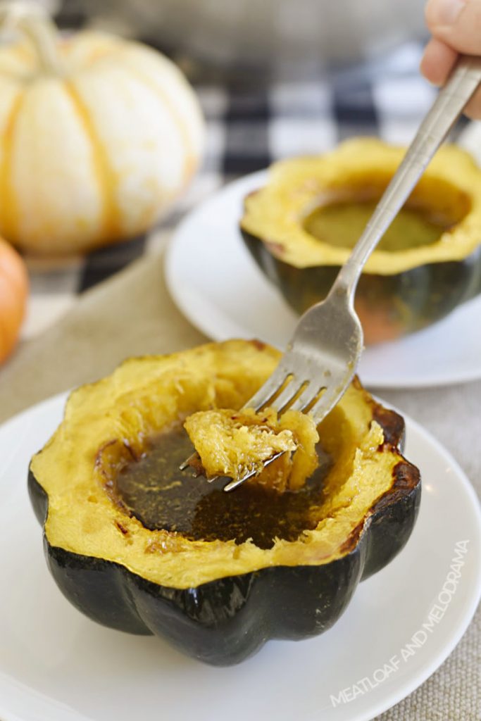 acorn squash with maple syrup and brown sugar on fork