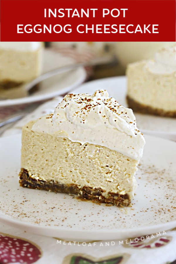 instant pot eggnog cheesecake with whipped cream and nutmeg on a plate