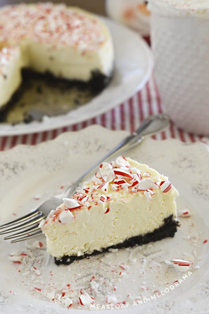 pressure cooker peppermint cheesecake with candy cane topping on plate
