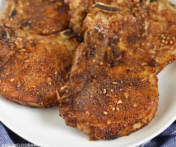 dry rubbed air fryer pork chops on a platter