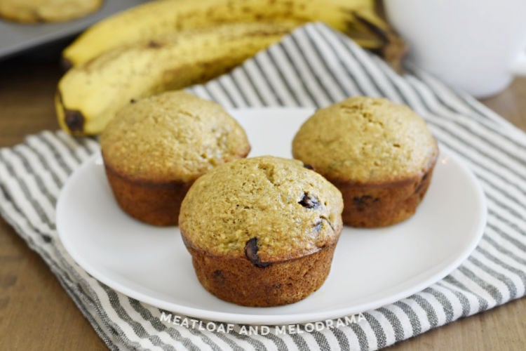 banana applesauce muffins with chocolate chips on a white plate