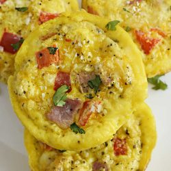 stack of baked ham and cheese egg muffins