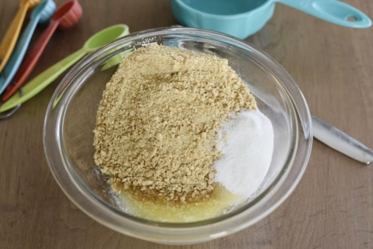 graham cracker crumbs, sugar and melted butter in mixing bowl