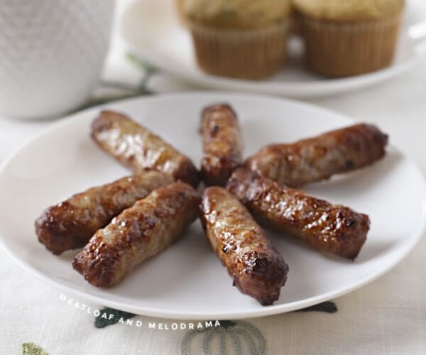 air fried breakfast sausage links on a white plate